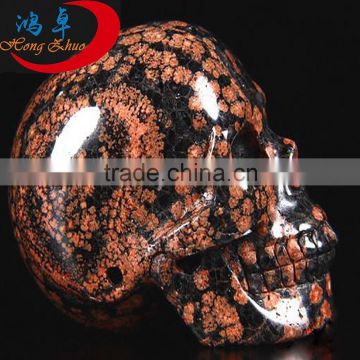 Natural carved Black red semi-precious stone skull carving