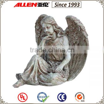 sitting angel statue