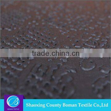 Dress fabric supplier Latest design Custom Spandex embossed knitted fabric
