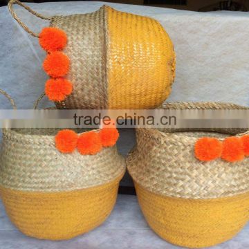 High quality best selling eco-friendly Natural & Orange seagrass baskets with orange pompoms from Vietnam