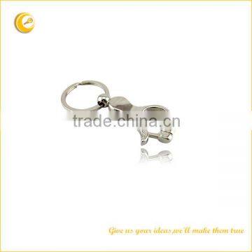 Finger shaped bottle opener keychain