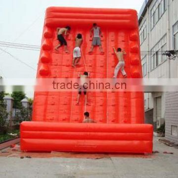 orange inflatable climbing wall