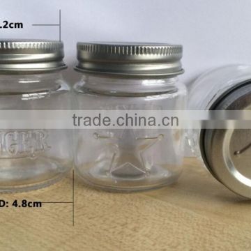 small glass jars with lids
