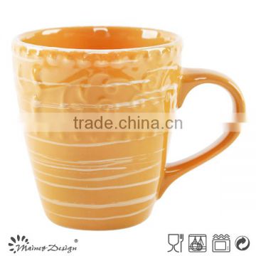 wholesale ceramic stoneware emboss color glaze mug