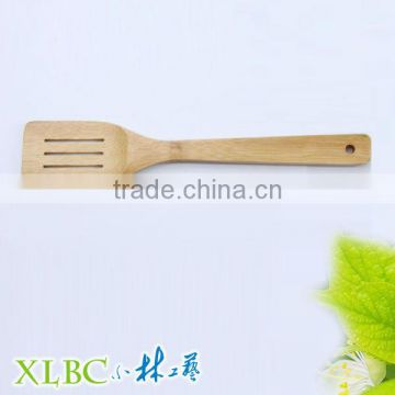 Pierced bamboo spoon