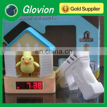 Glovion shooting alarm clock creative gun alarm clock cucoo bird style alarm clocks