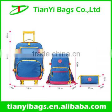Young girl bags girl trolley school bag
