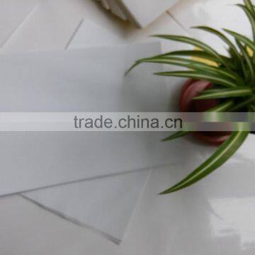 cast coated sticker paper with white slit back liner