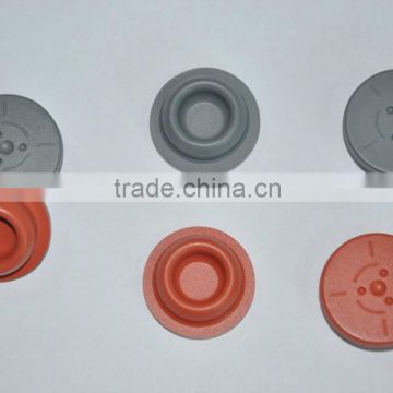 Halogenated butyl rubber stoppers for injection use