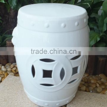 White ceramic stool for garden decor