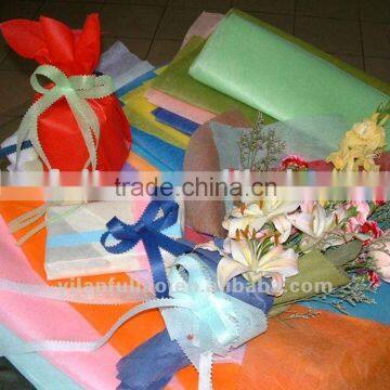 polyester impregnated nonwoven fabric for gift packing