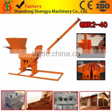 Shengya manual clay interlocking brick making machine earn money at home small scale brick machine QMR2-40
