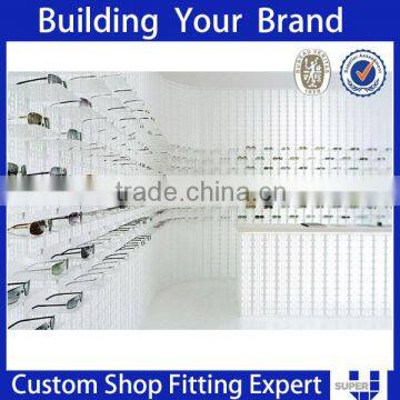 Simple style white wall mouted sunglasses optical store design