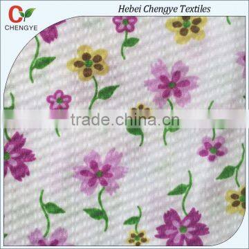 cheap 100% polyester embossed printed clothing fabric