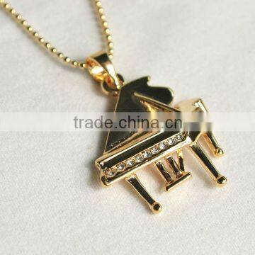 18k Gold plated and platina plated music necklace