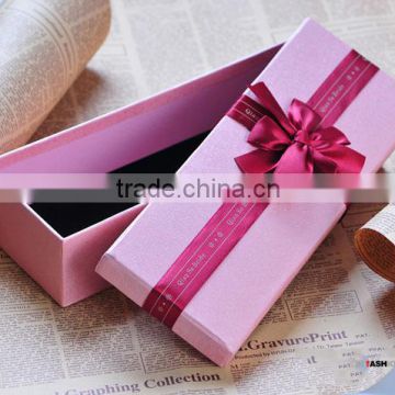 romantic pink cardboard jewelry box with bow tie