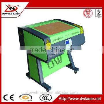 Jinan 60w 80w CO2 mini cutter laser engraver small desktop cutting engraving machine cheap price