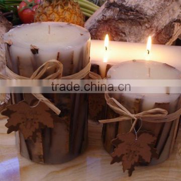 candles with wooden strips outside