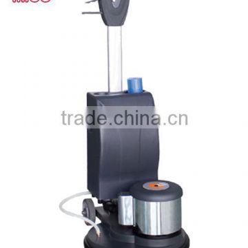 Hand held carpet and floor cleaning machine