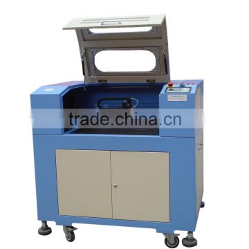 Own Big factory to production 2013 Latest Low cost co2 laser engraving machine