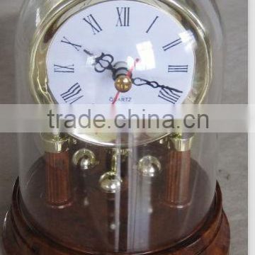 grand gyration clock, rotating pendulum clock, mantel swivel clock
