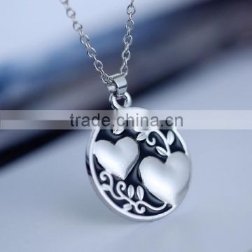 Double hearts round heavy silver heart puzzle necklace