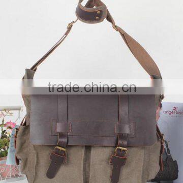 Vintage canvas shoulder bag with leather trim