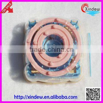 Plastic round knitting loom for making flower