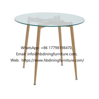 Round glass dining table with wooden legs