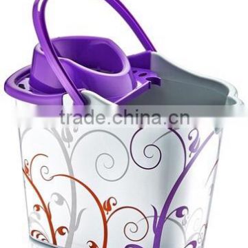 Plastic cleaning bucket very good design with plastic handle with its squeezer and 4 wheels under