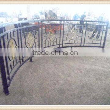 Wrought iron arc pattern railing for interior decor