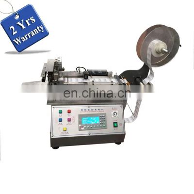 UGS2050 hot cold  mini table top automatic fabric woven label cutting machine, small garment wash care ribbon cutter