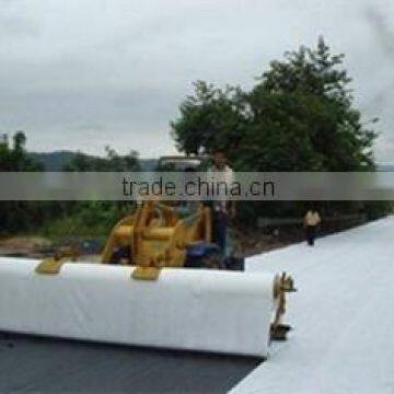 Filament nonwoven geotextile for road and highway construction