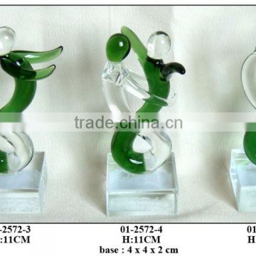 green and clear glass figures decoration