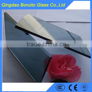 Light blue reflective glass for building glass