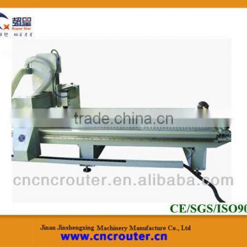 Jinan Rotary cylinder cnc carving machine with the rotary clamp on front of the vacuun table