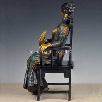 A SET OF FOUR STYLIZED MODERN BRONZE STATUES OF ME, A BRONZE STATUE OF A CHINESE WOMAN