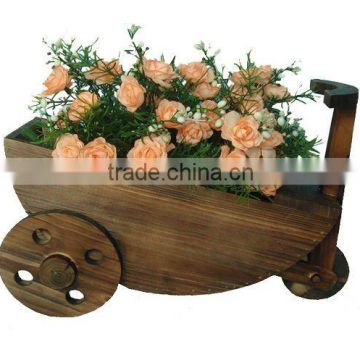 wooden barrow flower pot