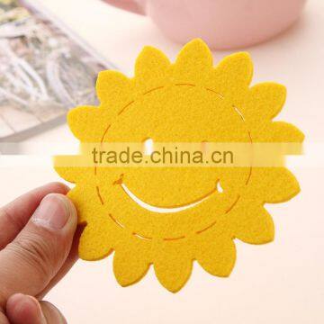 yellow felt smile coasters with felt table decoration mat