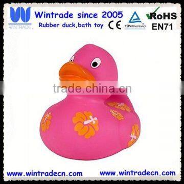 Floating pink duck with sunflower duck