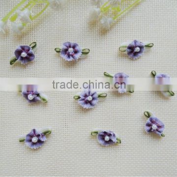 Purple handmade decorative mini ribbon flower with pearl