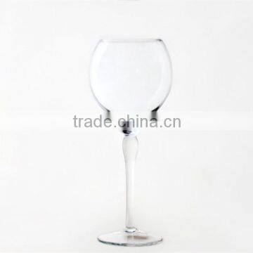Handmade mouth blown transparent red wine glass bottle