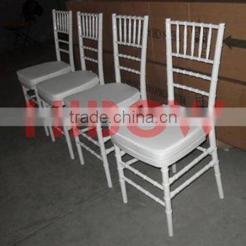 white resin chiavari chair and tiffany chair