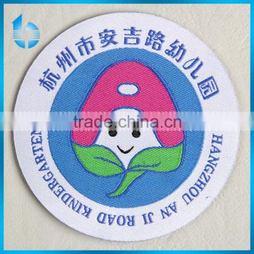 Woven fabric badge with round cut for school children clothing