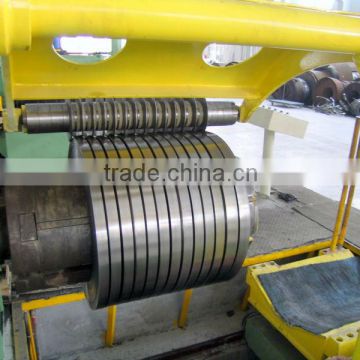 coil slitter rewinder machine with hold down arms