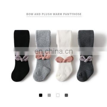 Children's thick pantyhose autumn and winter new girls solid color terry tights cute bow baby bottoming socks