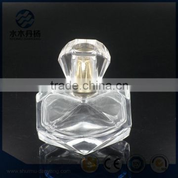 Fancy 80ml crystal clear glass perfume bottle with decorative cap