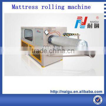 Flexible mattress wrapping machine