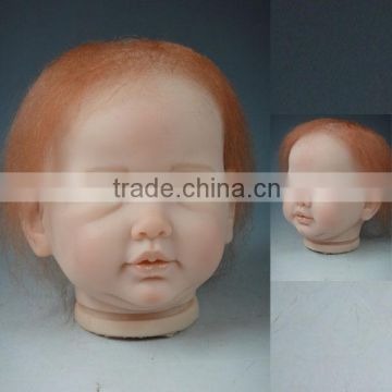Silicone vinyl baby doll heads