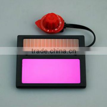 Solar powered auto dimming blue welding lens